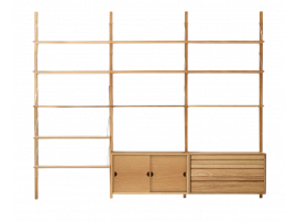 Mid modern scandinavian shelving system, model Royal System by Poul Cadovius, new edition. Comb 3