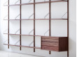 Mid modern scandinavian shelving system in walnut, model Royal System by Poul Cadovius, new edition. 