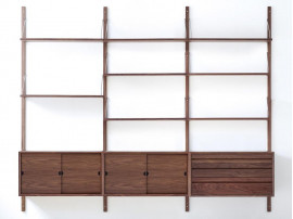 Mid modern scandinavian shelving system in walnut, model Royal System by Poul Cadovius, new edition.