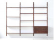 Mid modern scandinavian shelving system in walnut, model Royal System by Poul Cadovius, new edition. 