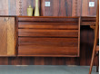 Wall rosewood shelving unit 