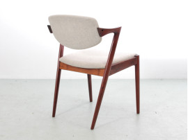 Suite de 10 chaises scandinaves en palissandre de Rio modele 42