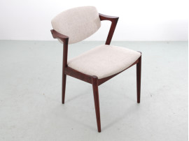 Suite de 10 chaises scandinaves en palissandre de Rio modele 42