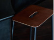 Adam stool.  Nature rectangular leather seat. Black, grey or white base. H50. 