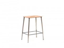 Adam stool.   Rectangular leather seat and raw steel structure.  H50 cm. 