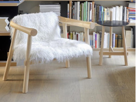 Altay Armchair. Natural upholstered in white Mongolian goatskin. 