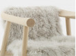 Altay Armchair. Natural upholstered in white Mongolian goatskin. 