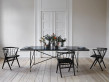 Carrare marble dining table 230 cm.  Black frame with brass. 