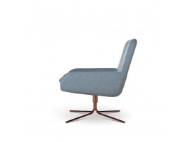 Chaise pivotante scandinave modèle Coco. 