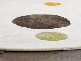 Custom hand tufted  Mr Dottie round rug. 