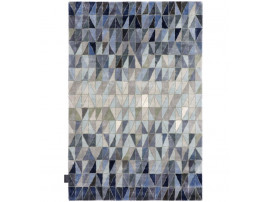 Custom hand tufted Wedge Blue rug.