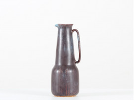 Tall ceramic pitcher