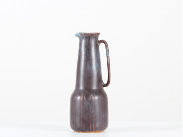 Tall ceramic pitcher