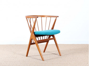 Petit fauteuil scandinave à barreaux