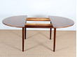 Extending round dining table in rosewood, 4 to 6 seats