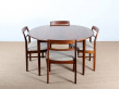 Extending round dining table in rosewood, 4 to 6 seats