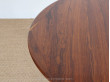 Extending round dining table in rosewood, 4 to 6 seats