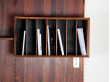 Wall rosewood shelving unit 