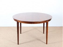 Scandinavian round table in Rio rosewood 4/8 seats.