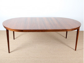 Scandinavian round table in Rio rosewood 4/8 seats.