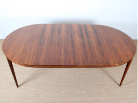 Scandinavian round table in Rio rosewood 4/8 seats.