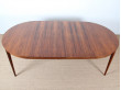Scandinavian round table in Rio rosewood 4/8 seats.