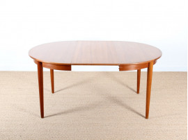 Table de repas scandinave ronde en teck. 4/6 personnes