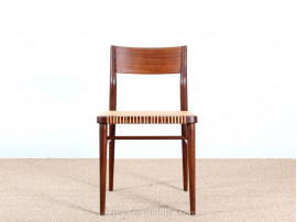 Set of 6  chairs in teak and cane. 