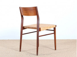 Set of 6  chairs in teak and cane. 