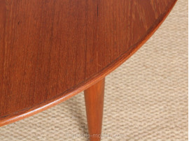 Scandinavian extendable round table in teak, 4/10 seats