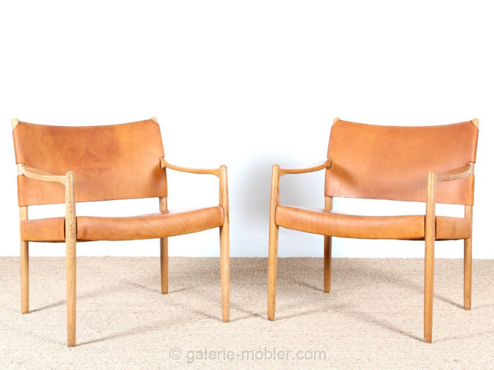 Pair of scandinavian oak and leather easy chairs