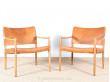 Pair of scandinavian oak and leather easy chairs