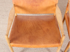 Pair of scandinavian oak and leather easy chairs