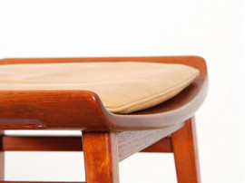 Scandinavian teak stool with a leather cushion