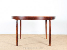 Scandinavian round dining table in rosewood 6/10 seats.