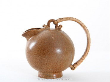 Scandinavian pottery : pitcher with a rattan handle, designed by Arne Bang