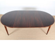 Extending circular dining table in rosewood 4/8 seats