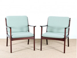 Pair of mahogany scandinavian armchairs