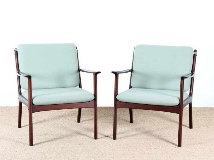 Pair of mahogany scandinavian armchairs