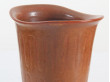 Scandinavian vase with incised pattern and reddish brown haresfur glaze by Gunnar Nylund for Rörstrand.