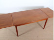 Danish mid modern dining table in teak with extensibles leaves