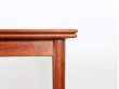 Danish mid modern dining table in teak with extensibles leaves