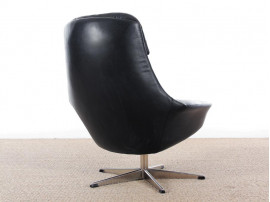 Fauteuil scandinave pivotant en cuir 