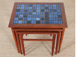 Danish mid-century modern nesting tables in teak and ceramic