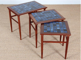 Danish mid-century modern nesting tables in teak and ceramic