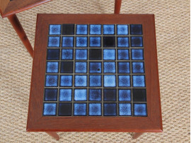 Danish mid-century modern nesting tables in teak and ceramic