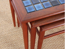 Danish mid-century modern nesting tables in teak and ceramic