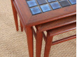 Danish mid-century modern nesting tables in teak and ceramic