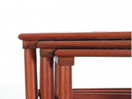 Danish mid-century modern nesting tables in teak and ceramic