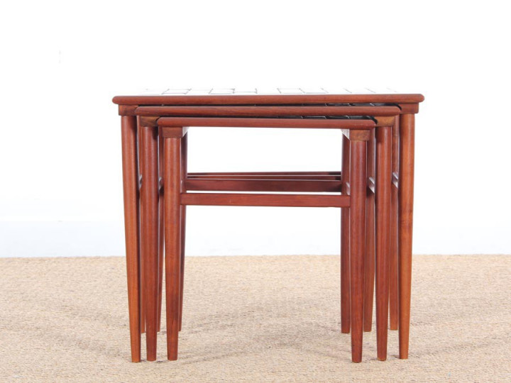 Danish mid-century modern nesting tables in teak and ceramic